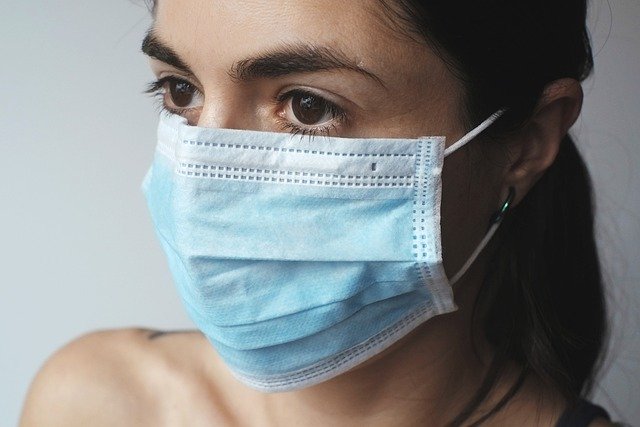 woman wearing surgical mask